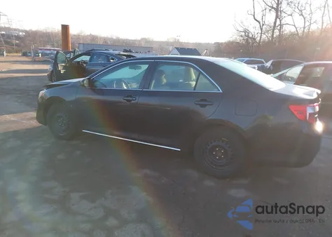 2014 Toyota Camry Le z USA, uszkodzony, nr VIN 4T4BF1FK7ER372099